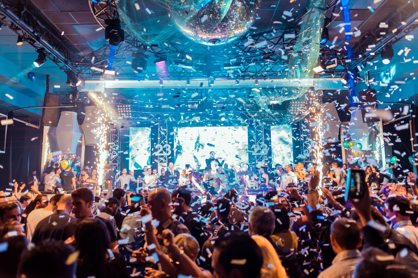 Group dancing disco bar VIP nightclub